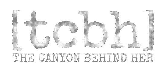 Logo: The Canyon Behind Her